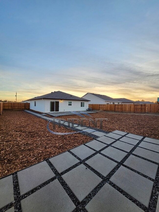 Building Photo - NEWER SOLAR HOME! This is a 3 bedroom, 2 bath house
