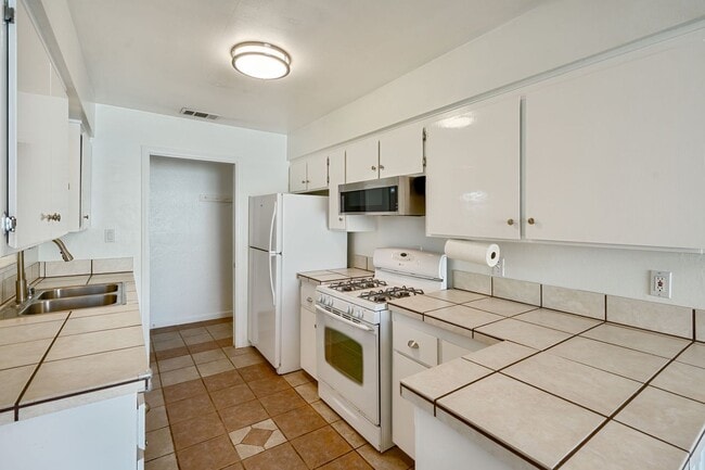 Building Photo - 3BR + Office Home in Excellent Condition with Storage Sheds and Garage Workspace!