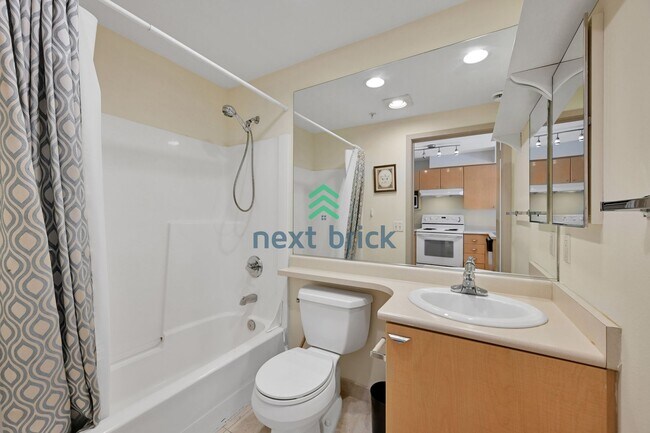 Building Photo - Modern Studio with Sleeping Alcove & Incre...