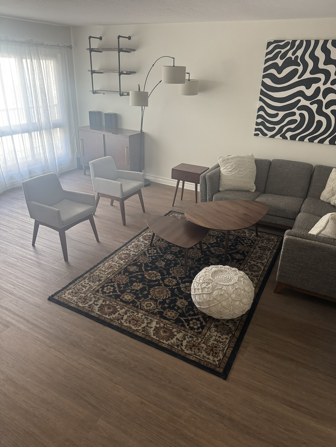 Living room view 3, looking back towards outside of unit. - 6001 Canterbury Dr