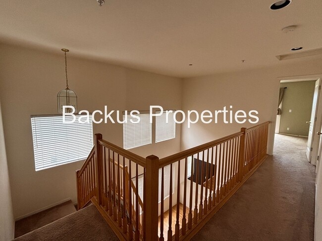 Building Photo - Great two-level home in Las Palmas II with scenic views