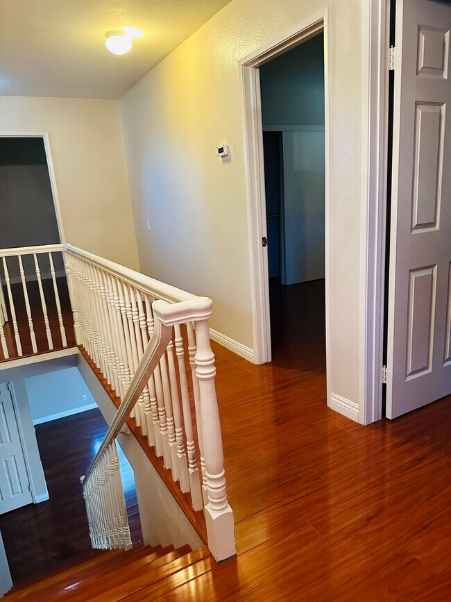 Hallway access to 3 bedrooms - 555 W Lemon Ave