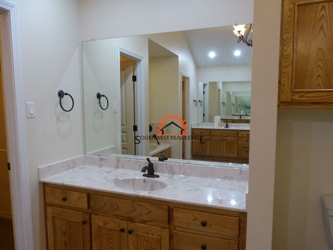 Building Photo - Stunning 4 bedroom 3 bath brick home with 5 car garage!