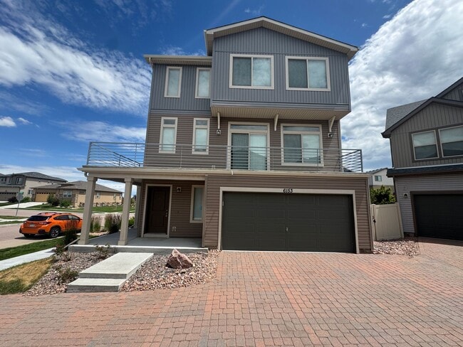 Building Photo - Modern 3-Story Corner Lot Home with Hot Tu...