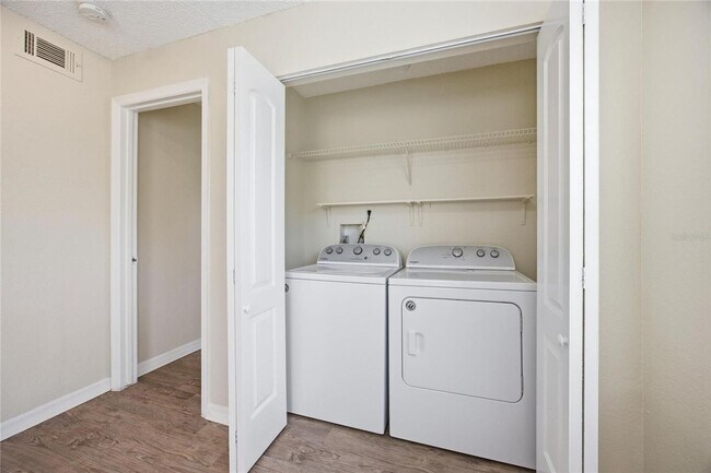 Building Photo - Location! Beautifully located condo just minutes from Orlando International Airport,