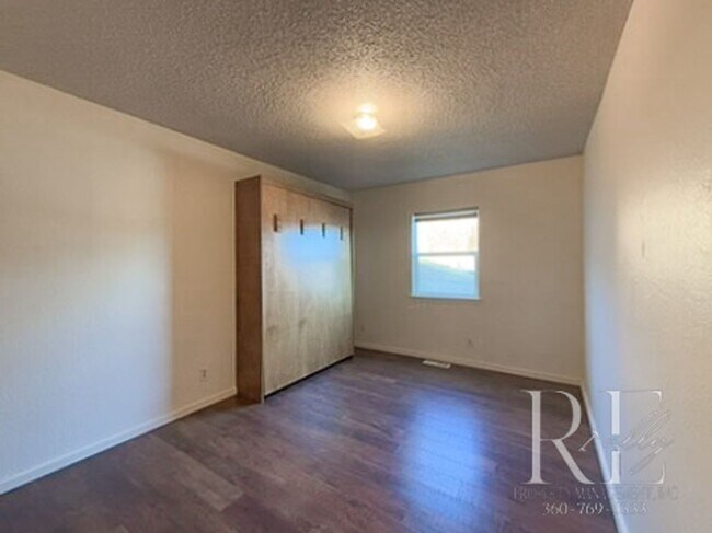 Building Photo - Waterfront Bliss: Stunning Puget Sound Views & Your Own Private Beach!