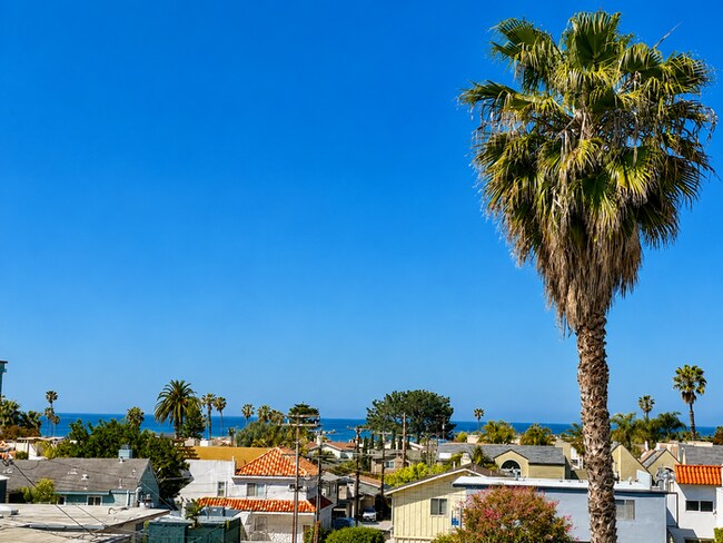 Building Photo - Coastal Living at It's Best! Pacific Beach Townhome with Incredible Rooftop Views!