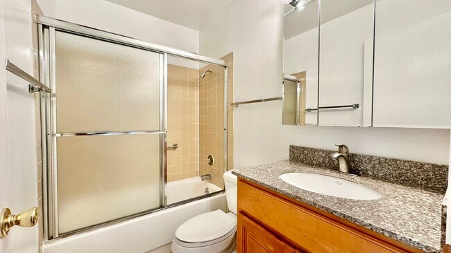 Building Photo - Top-floor with Storage Room & Huge Walk-In...