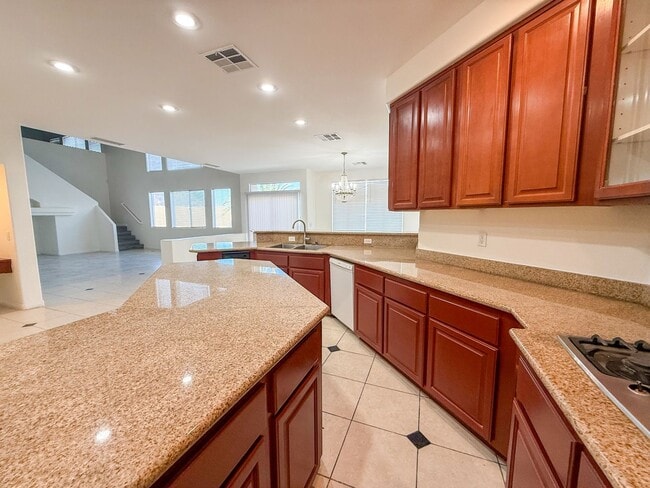 Building Photo - SPACIOUS HOME IN GATED COMMUNITY WITH POOL, RV PARKING & 4-CAR GARAGE!