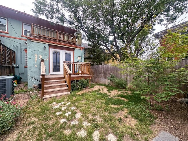 Building Photo - A home where old-world charm meets modern sophistication!