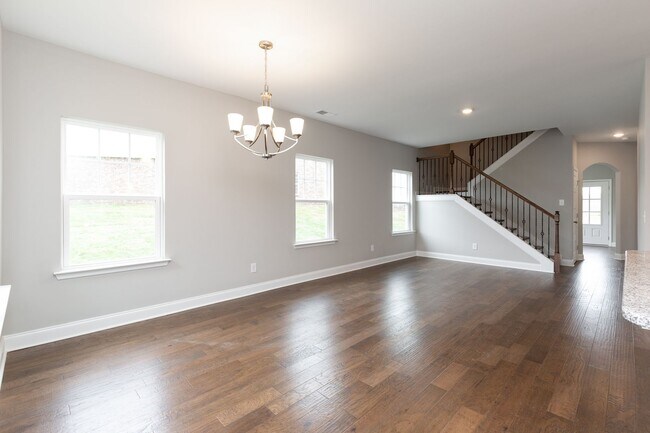 Building Photo - **BE THE LUCKY ONE TO LIVE IN THIS 2022-BUILT UPSCALE COTTAGE HOME IN THE PRESERVE AT BELLE POINTE**