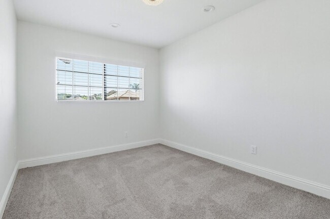 Building Photo - Stunning Upgraded 4BR Home with Pool in Desirable Rancho San Diego – Move-In Ready