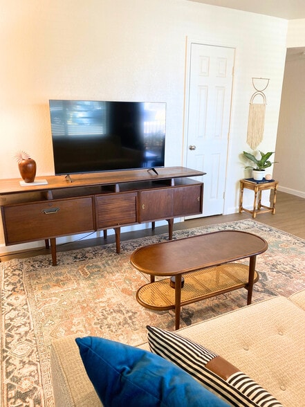 Smart TV perfect for movie nights or binge-watching your favorite shows. - 1795 W 28th St