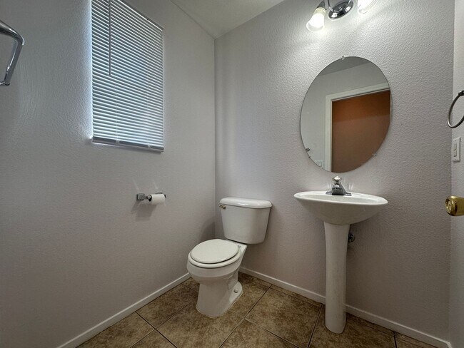 Building Photo - 3 bed house with new laminate flooring and...