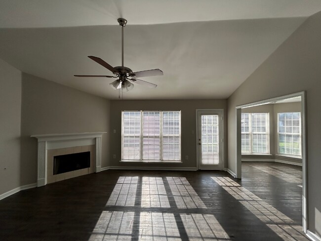 Building Photo - Spacious 4BR/2BA Olive Branch Home | 1,965 Sq Ft, Modern Fireplace, Bay Window & 2-Car Garage