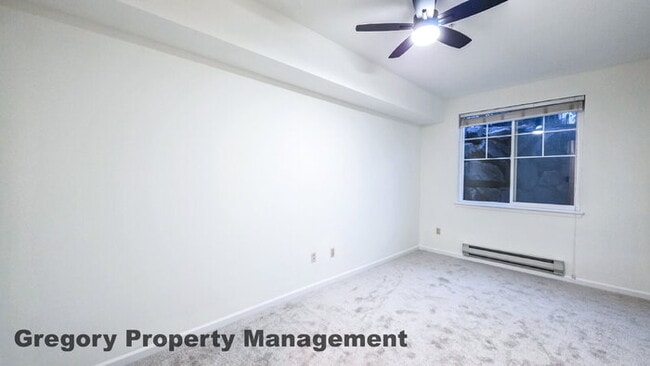 Building Photo - Sunlit & Spacious Ground-Level Condo | 12-Foot Ceilings, Luxury Amenities & Ideal Locale