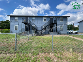 Building Photo - Charming 2-Bedroom Fourplex with Fenced Ba...