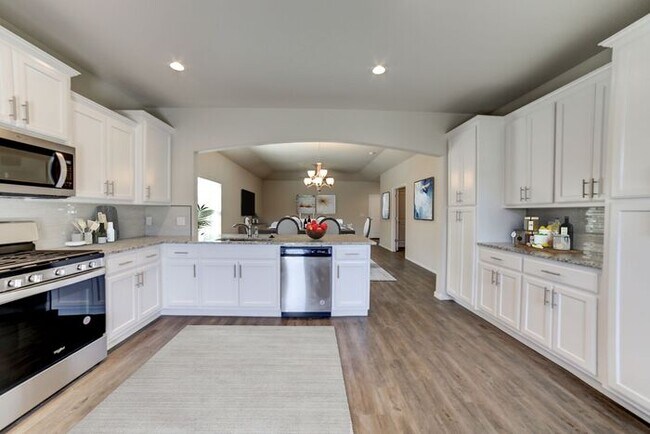 Building Photo - 3/2/2 Patio Home! Lawncare included plus a...