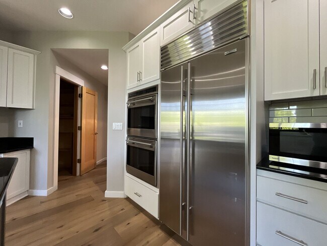 Building Photo - Beautifully Updated 3-Bedroom Bethany Home with Chef's Kitchen, Huge Bonus Room and Private Backyard