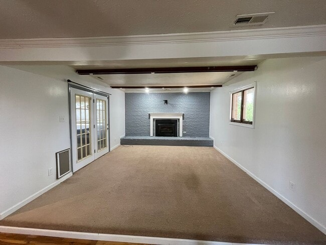 Building Photo - Spacious Home with Large Yard, Hot Tub, and More