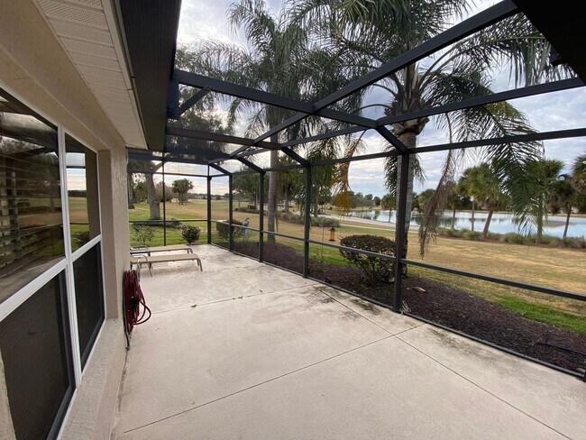 Building Photo - SEASONAL RENTAL. Large 4 Bed + 4 1/2 Baths Home, w/Views of the Jacaranda Golf Course and Lake in...