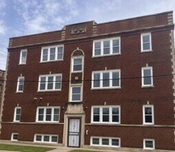 Building Photo - 630 E 8th Ave