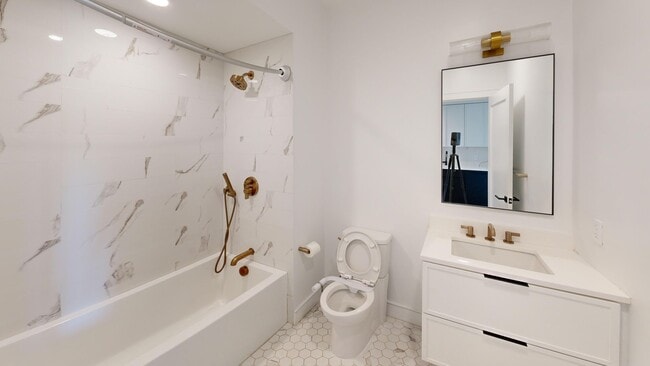 Building Photo - Studio with Laundry in Unit; Gym on Site! Pet-friendly
