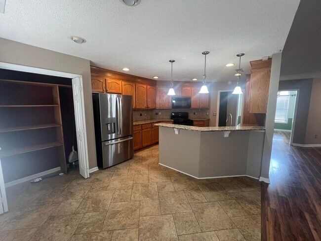 Building Photo - 6770 J J Roberts Dr