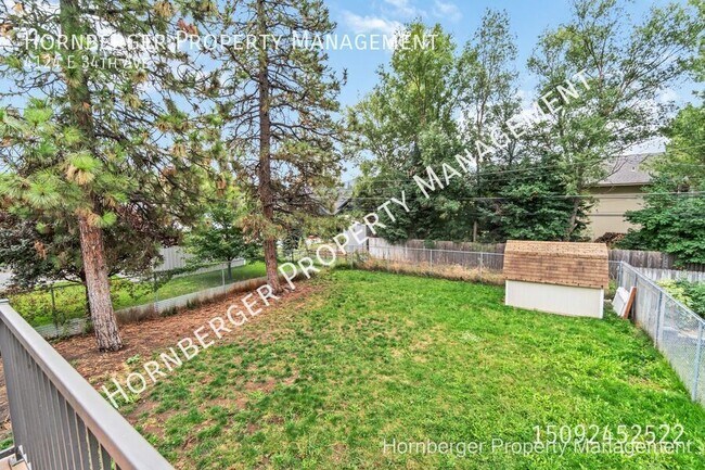 Building Photo - 4124 E 34th Ave