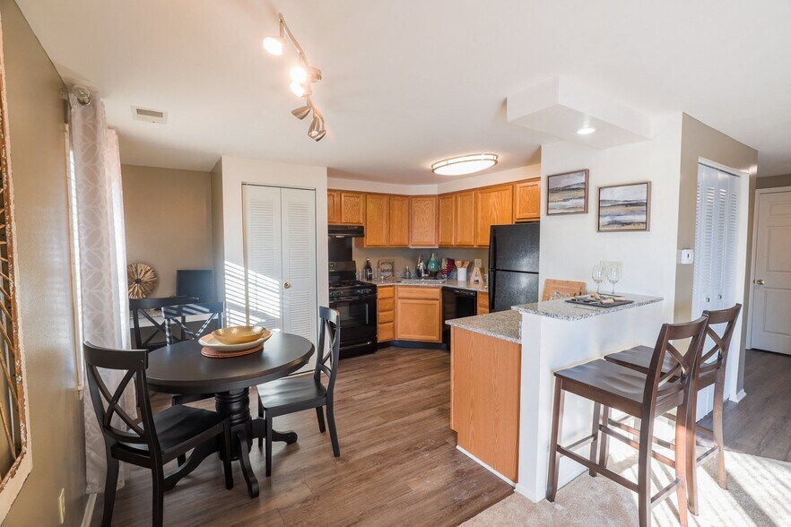 Kitchen and Dining Room at Archer's Pointe Apartments - Archers Pointe