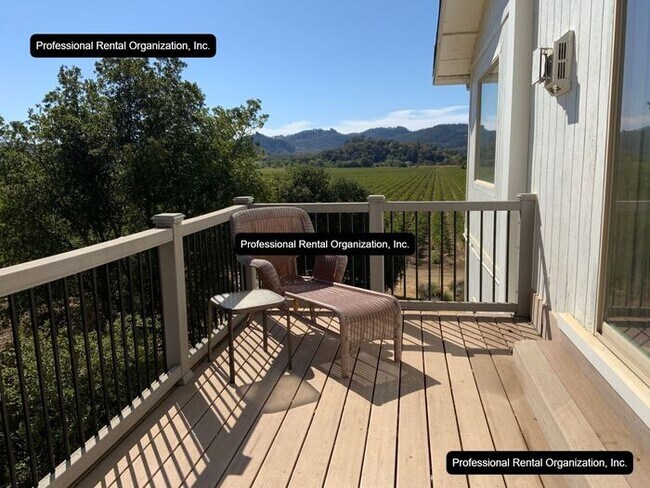 Building Photo - A price and views that can't be beat- Upper Flat with deck & expansive Vineyard and Sunset views