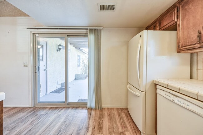 Building Photo - 3 bedroom, 2 bath with large living room and brick fireplace.  Good size kitchen with tons of cab...