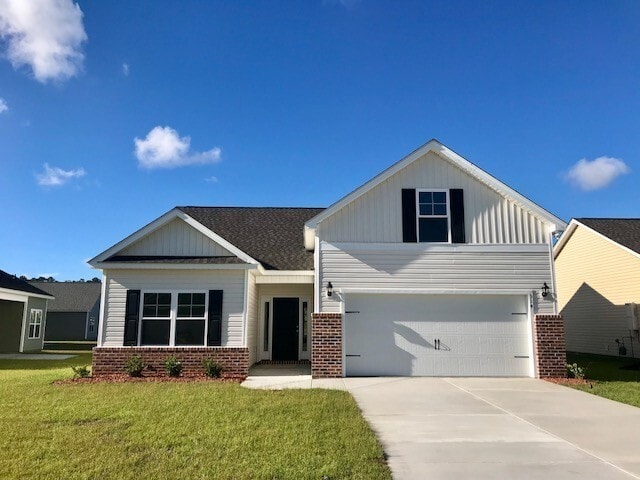 Building Photo - POND FRONT 4 Bedroom home in Jackson Estates - St. James Schools w/ 2 car garage!