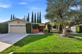 Building Photo - Beautifully Updated 3BR/2BA Home with Private Garden Oasis