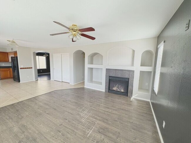 Building Photo - 4BR / 2.5BA Home with Expansive Lot – 2-Car Garage, Community Pools & Golf