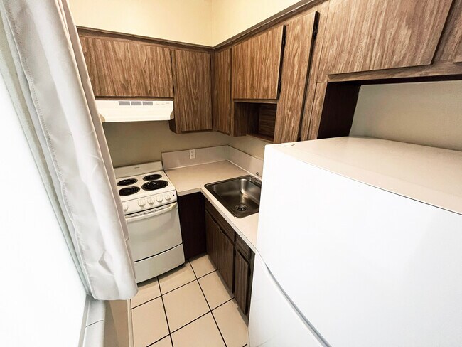 Compact and efficient kitchen with new appliances. - 419 Ocean Ave