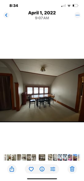 Dining area with table and chairs. - 810 E Front St