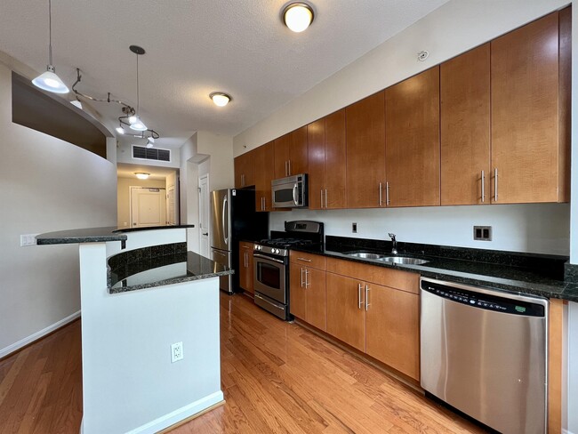 Building Photo - 1390 Kenyon St NW