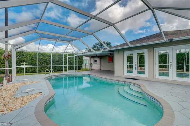 Building Photo - 42nd Terrace Southwest, Naples, FL 34116 -...