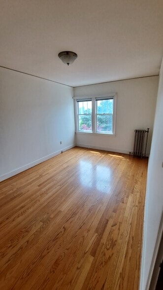 Bedroom with current white toned walls - 1631 16th Ave