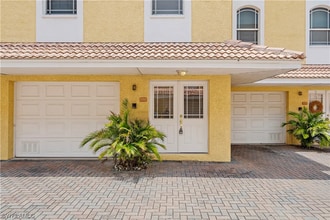 Building Photo - Stunning 3-Story Beach Townhome – Steps from the Gulf! 3bed|3bath