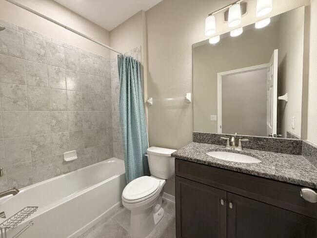 Building Photo - "Charming 3-Bed Oasis with 2 Full Baths in...