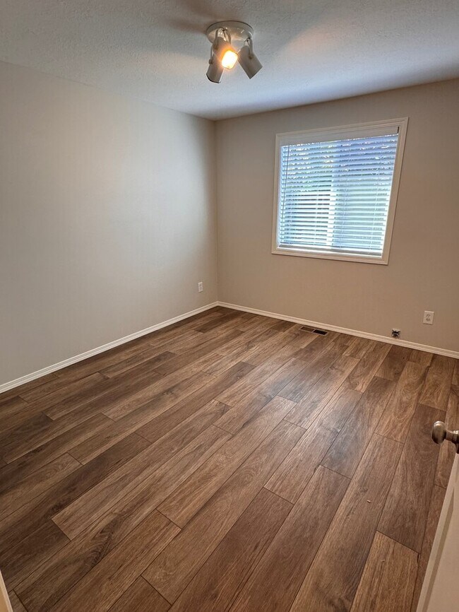 Building Photo - REMODELED Home Featuring LVP Flooring Thro...