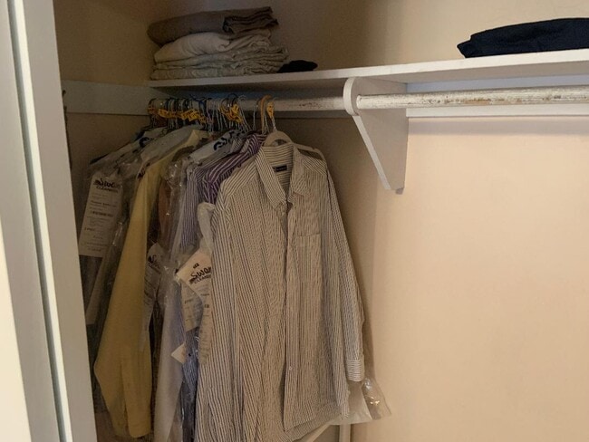 Closet with hanging rod and shelving - 5804 Searl Ter
