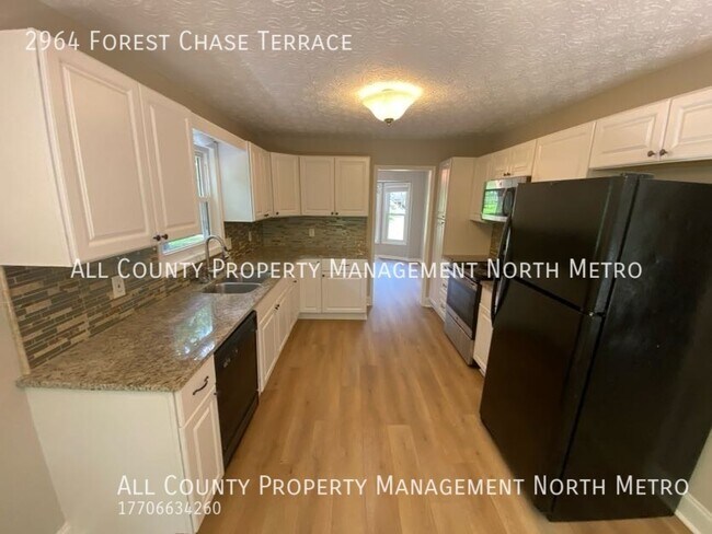 Building Photo - Updated 4BR/3BA in Lassiter High School Di...