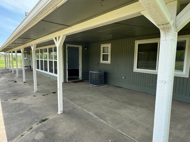 Building Photo - Available July 2025! 4-Bedroom, 2-Bathroom...