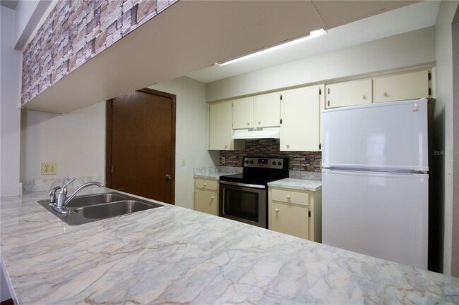 Building Photo - 6309 Highland Gardens Ct