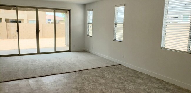 Building Photo - The 2 YEARS NEW 4 bedroom + 3 car garage r...