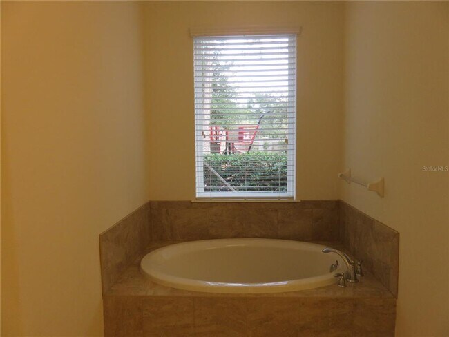Building Photo - 8811 Citrus Palm Dr