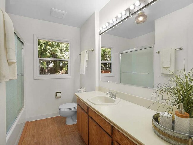 Bathroom with a full tub and now privacy windows film coverings. - 4157 SE Brooklyn St